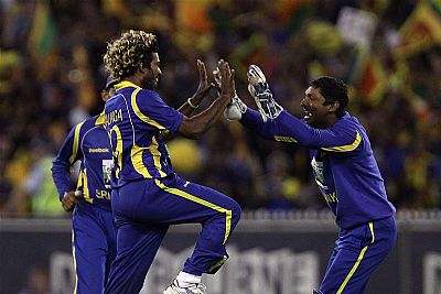 Sri Lankan players celebrate after defeating Australia to reach in the finals of Commonwealth Bank Series
