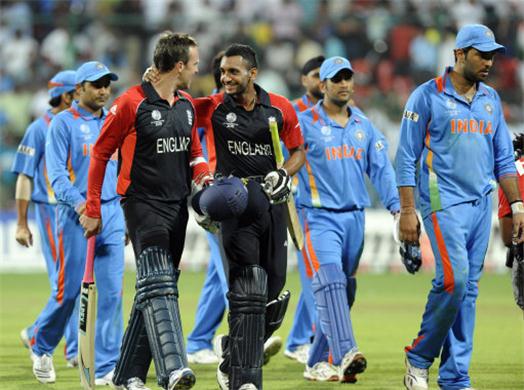 India Vs. England, ICC Cricket World Cup 2011 - Demoralized Indian Cricket Team walks out while jubilant English players waltz to the fame.